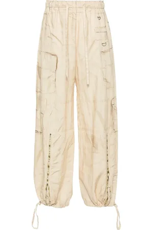 Acne Studios Pantalones anchos con estampado trompe l