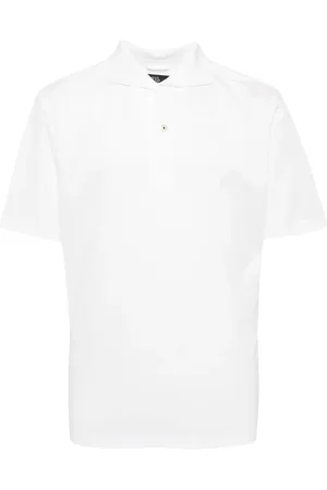 MAN ON THE BOON. Playera tipo polo de piqué manga corta