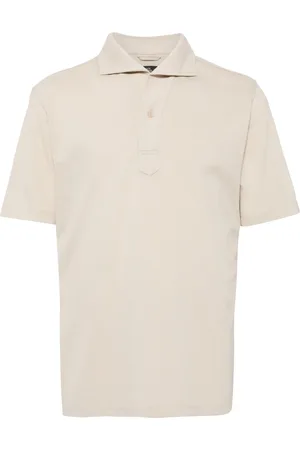 MAN ON THE BOON. Playera tipo polo de piqué manga corta