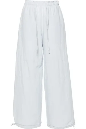 Acne Studios Pantalones anchos con logo bordado
