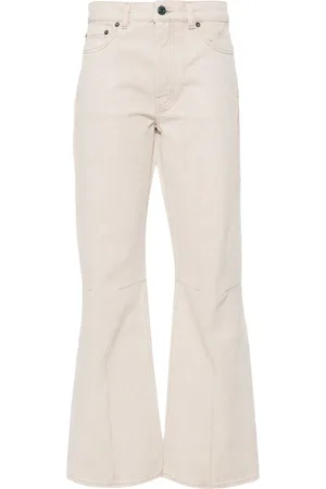 OUR LEGACY Jeans anchos con abertura Moto