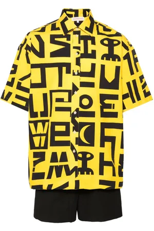 WALTER VAN BEIRENDONCK Jumpsuit con logo estampado