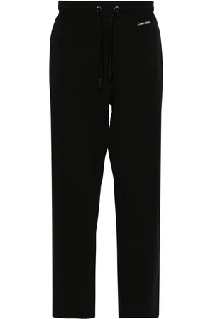 Calvin Klein Pants con cordones en la pretina y logo estampado