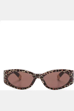 Jacquemus Lentes de sol con armazón ovalada y estampado de leopardo
