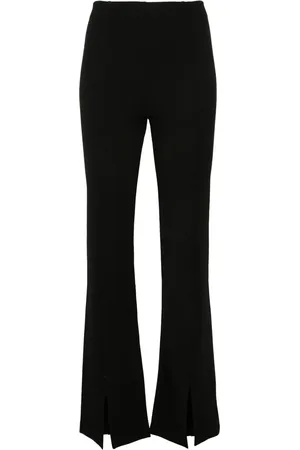 Maje Pantalones acampanados con abertura