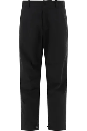 A.P.C. Pantalones tapered con botones de presión