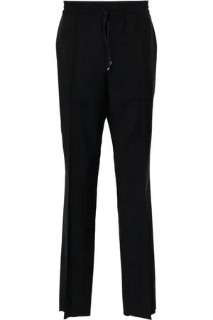 VALENTINO GARAVANI Pantalones tapered con cordones en la pretina