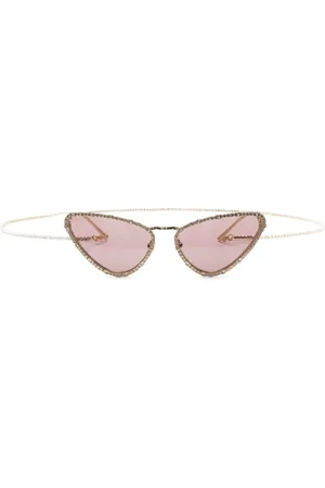 Gucci Lentes de sol con armazón cat eye y detalles de cristal