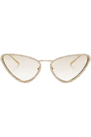 Gucci Lentes de sol con armazón cat eye y detalles de cristal