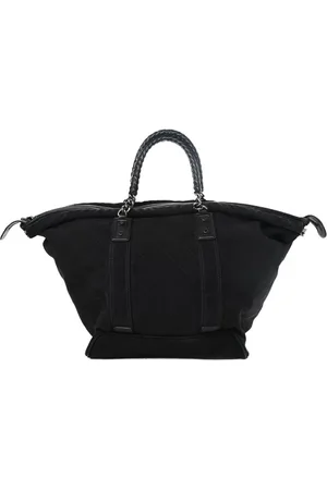 CHANEL Bolsa de viaje grande con capitonado de rombos 2015