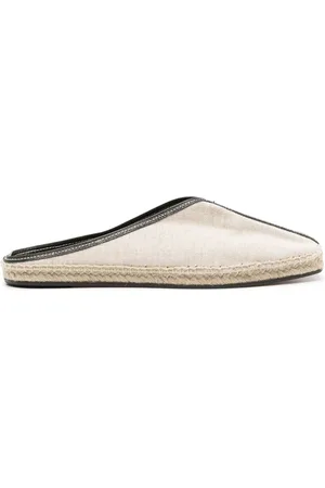 Totême Slippers estilo alpargatas con ribete de cuero