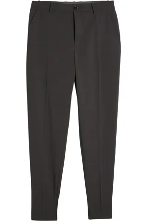 UNDERCOVER Pantalones tapered con aplique del logo