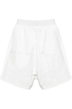 Hed Mayner Shorts acampanados con efecto arrugado