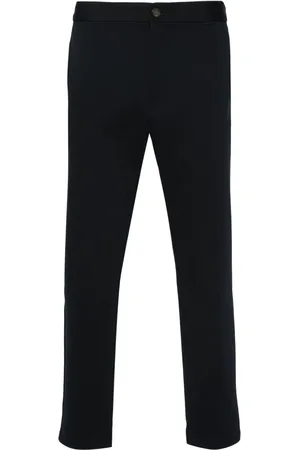 Calvin Klein Pantalones tapered con etiqueta del logo