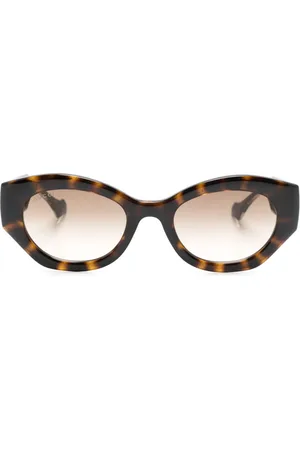 Gucci Lentes de sol con armazón ovalada