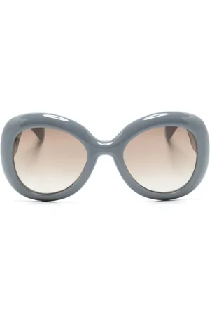 Moschino Lentes de sol con armazón oversize y logo en relieve