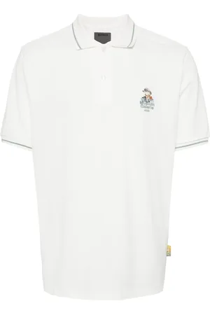 Musium Div. Playera tipo polo con logo bordado