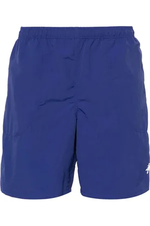 STUSSY Shorts de playa con logo estampado