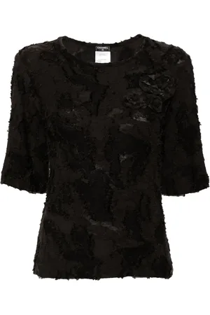 CHANEL Blusa con aplique Camellia