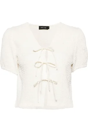 tout a coup Playera texturizada con moño