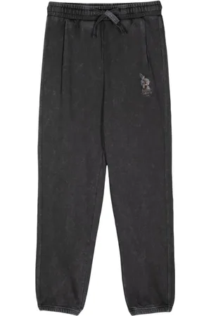 Musium Div. Pantalones con logo estampado y cordones