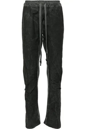 ISAAC SELLAM EXPERIENCE Pantalones slim con efecto envejecido