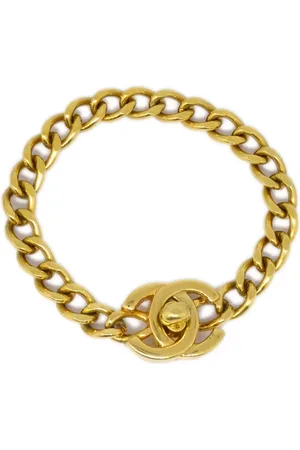 CHANEL Pulsera con cierre giratorio y logo CC 1996