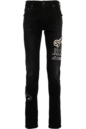 AMIRI Skinny jeans con tiro medio