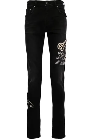 AMIRI Skinny jeans con tiro medio