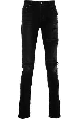 AMIRI Skinny jeans con efecto envejecido