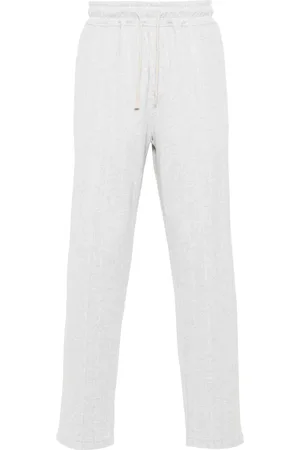 ELEVENTY Pantalones tapered con estampado de rayas diplomáticas