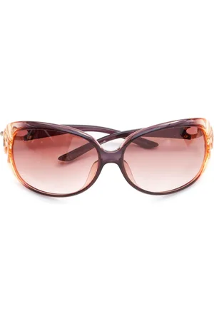 Dior Lentes de sol con armazón ovalada y placa del logo
