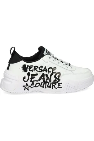 VERSACE Tenis con agujetas y logo estampado