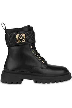 Moschino Botines con placa del logo