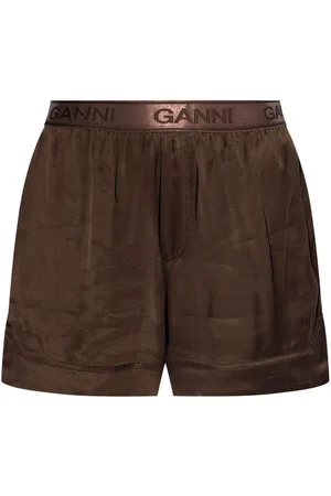 Ganni Shorts con logo en la pretina