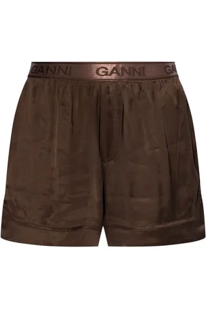 Ganni Shorts con logo en la pretina