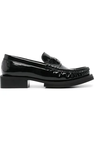 Ganni Mocasines con placa del logo