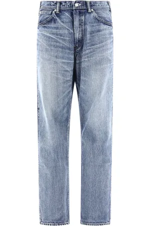 HUMAN MADE Jeans con efecto lavado