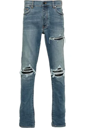 AMIRI Skinny jeans MX1 con efecto envejecido