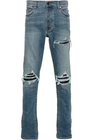 AMIRI Skinny jeans MX1 con efecto envejecido