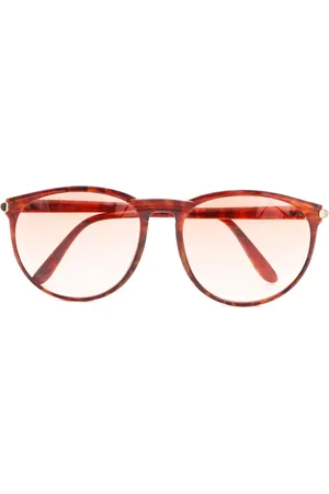 Saint Laurent Lentes de sol con armazón redonda estilo carey