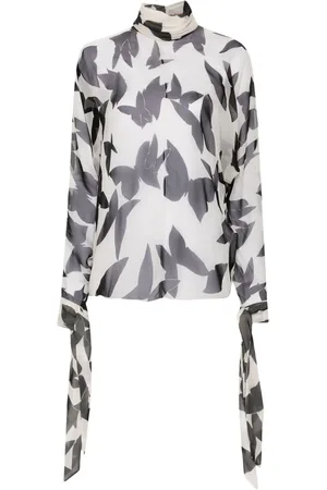 Saint Laurent Blusa de seda con mariposas estampadas