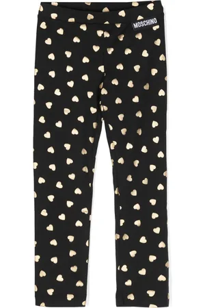 Moschino Leggins con corazones estampados