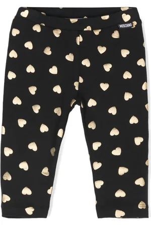 Moschino Leggins con corazones estampados