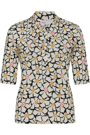 ROSETTA GETTY Playera tipo polo con medias mangas y estampado floral