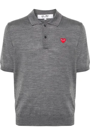 Comme des Garçons Playera tipo polo con parche de corazón