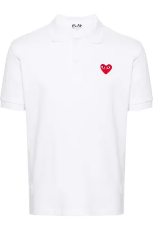 Comme des Garçons Playera tipo polo de piqué con parche de corazón