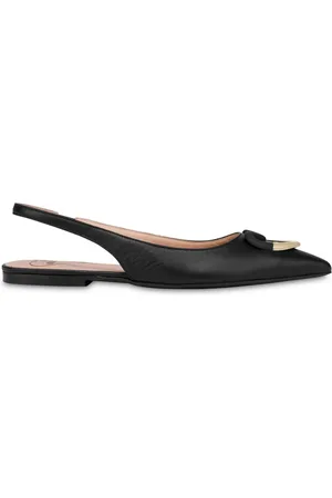 Moschino Flats con tira trasera