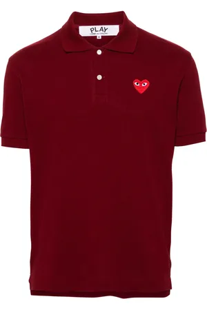 Comme des Garçons Playera tipo polo con parche de corazón
