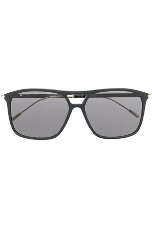 Gucci Lentes de sol con armazón cuadrada y micas oscuras